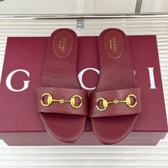 SLIDE SANDALS IN RED CALFSKIN WITH GOLD HARDWARE