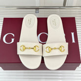 SLIDE SANDALS IN WHITE CALFSKIN WITH GOLD HARDWARE