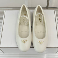 PRADA 25S SOFT PADDED BALLERINAS IN IVORY NAPPA LEATHER