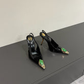 GREEN GEM-STUDDED SLINGBACK PUMPS IN BLACK PATENT CALFSKIN