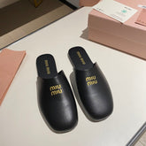 MULES SLIPPERS RETRO BLACK COWHIDE