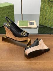 GG WEDGE PLATFORM IN BLACK CALFSKIN WITH GOLD HARDWARE