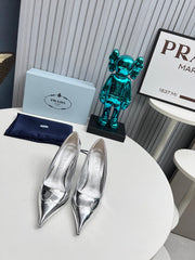 HIGH POINTED-TOE PUMPS IN SILVER GLOSSY CALFSKIN