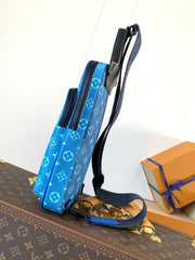 AVENUE SLINGBAG 31 IN BLUE AND BROWN TAIGA LEATHER