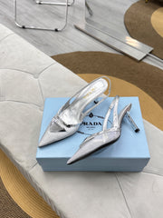 PRADA 25S TRIANGLE LOGO SLINGBACK PUMPS IN SILVER MESH FABRIC