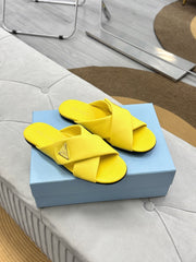 PRADA 25S SLIDE SANDALS IN YELLOW CALFSKIN LOGO