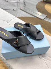 PRADA 25S SLIDE SANDALS IN BLACK CALFSKIN LOGO
