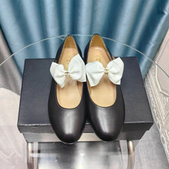 MARY JANE SHOES BLACK SHEEPSKIN WITH WHITE BOW