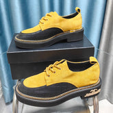 OXFORD SHOES IN GOLD YELLOW SUEDE AND BLACK SHEEPSKIN