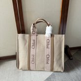 LAGRE WOODY TOTE BAG 45 IN BEIGE LINEN CANVAS LIGHT PINK WEBBING LOGO EMBROIDERY