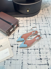 ALAIA FLAT SLINGBACK IN LIGHT BLUE PATENT CALFSKIN AND FILM