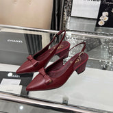 CHANEL 25S SANDALS WITH A BOW 60MM IN ROSSO ANCORA CALFSKIN