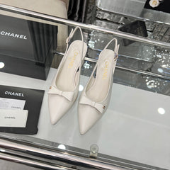 CHANEL 25S SANDALS WITH A BOW 60MM IN WHITE CALFSKIN
