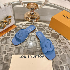 ISOLA FLAT SLIDE IN CORNFLOWER BLUE CALFSKIN