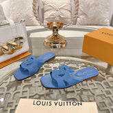 ISOLA FLAT SLIDE IN CORNFLOWER BLUE CALFSKIN