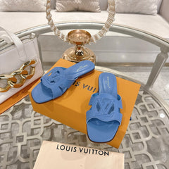 ISOLA FLAT SLIDE IN CORNFLOWER BLUE CALFSKIN