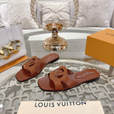 ISOLA FLAT SLIDE IN PENNY BROWN CALFSKIN