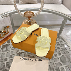 ISOLA FLAT SLIDE IN PALE YELLOW CALFSKIN