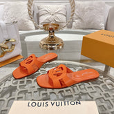 ISOLA FLAT SLIDE IN VIVID ORANGE CALFSKIN