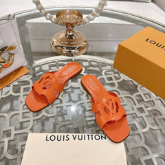 ISOLA FLAT SLIDE IN VIVID ORANGE CALFSKIN