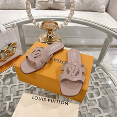 ISOLA FLAT SLIDE IN DUSTY PINK CALFSKIN