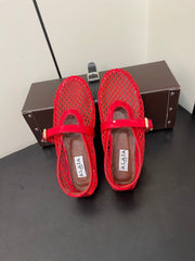 ALAIA BALLET FLATS IN CHERRY RED MESH FISHNET