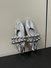 ALAIA SPHERE BALLET FLATS IN SILVER LAMBSKIN