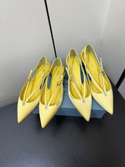 CUT-OUT PUMPS WITH BEAD BUCKLE IN LIGHT YELLOW SATIN