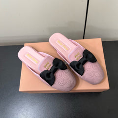 BOW MULES IN DUST PINK SUEDE