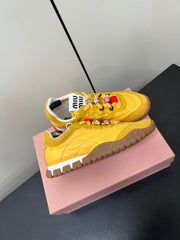 TYRE SNEAKERS IN YELLOW TECHNICAL FABRIC AND SUEDE WITH STICKER