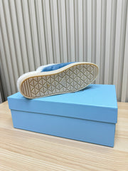 TRIANGLE LOGO FLATS IN AZURE BLUE SUEDE AND FUR LINING