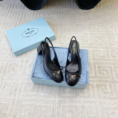 TRIANGLE LOGO SLINGBACK PUMPS WITH BOW IN BLACK CALFSKIN