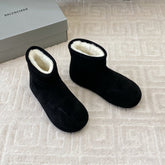 FLAT ANKLE BOOTS IN BLACK SUEDE AND SHEARLING LINING