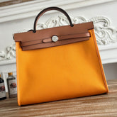 ZIP CABINE 31 BAG IN APRICOT ORANGE CANVAS AND BRONZE BROWN CALFSKIN