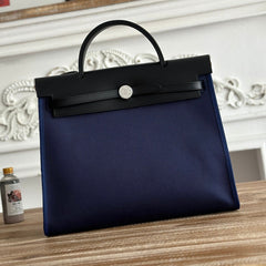 ZIP CABINE 31 BAG IN NAVY BLUE CANVAS AND BLACK CALFSKIN