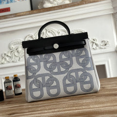 HERBAG ZIP 31 LAQUERED BAG IN OFF-WHITE MIX BLUE H PLUME CANVAS