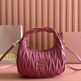 WANDER MATELASSÉ HANDBAG 23 IN CONTESSA PINK LAMBSKIN