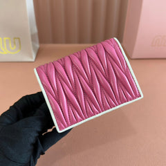 SMALL MATELASSÉ NAPPA LEATHER WALLET FUCHSIA