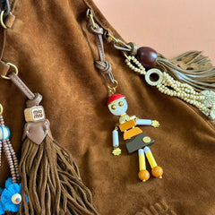 SUEDE BAG WITH TRICK 37 DARK BROWN