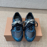 GYMNASIUM SNEAKER IN BLACK FABRIC AND BLUE SNAKE EFFECT CALFSKIN