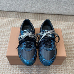 GYMNASIUM SNEAKER IN BLACK FABRIC AND BLUE SNAKE EFFECT CALFSKIN
