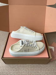 WASH SNEAKER MULES IN OFF WHITE DENIM WHITE STRIPED LACES