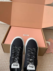 WASH SNEAKER MULES IN BLACK DENIM