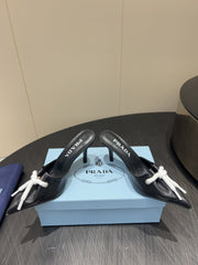 PRADA 25S BRAIDED DETAIL MULES 85MM IN BLACK CALFSKIN