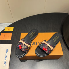 LV SLIDE SANDALS LOGO PRINT 25S IN BLACK CALFSKIN WITH CHERRY BLOSSOM BUCKLE