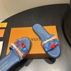 LV SLIDE SANDALS 25S IN DARK BLUE DENIM AND CALFSKIN WITH CHERRY BLOSSOM BUCKLE