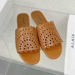 ALAIA VIENNE FLAT MULES IN CHOCOLATE BROWN LAMBSKIN