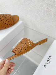 ALAIA VIENNE FLAT MULES IN CHOCOLATE BROWN LAMBSKIN