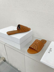 ALAIA VIENNE FLAT MULES IN CHOCOLATE BROWN LAMBSKIN