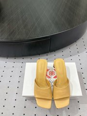 SQUARE-TOE MEDIUM HEEL MULES IN APACHE CALFSKIN LOGO EMBOSSED